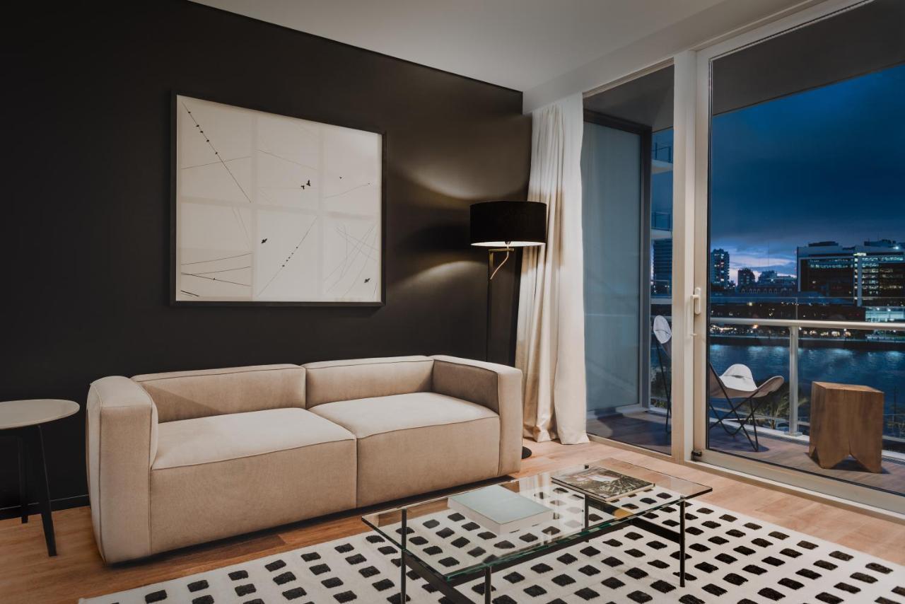 فندق Sls Buenos Aires Puerto Madero المظهر الخارجي الصورة A living room in a typical apartment