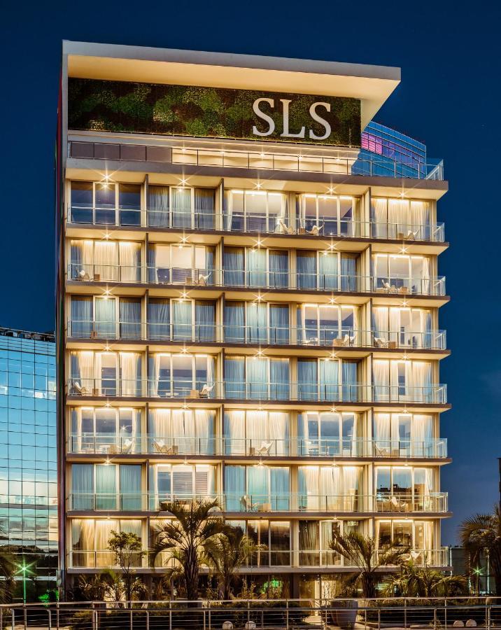 فندق Sls Buenos Aires Puerto Madero المظهر الخارجي الصورة The hotel at night